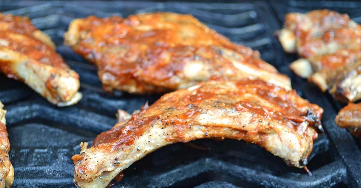 Sauced ribs on the grill.