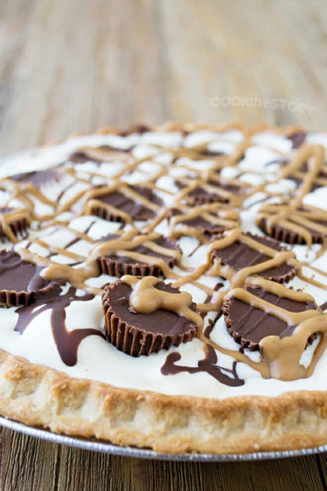 Peanut Butter Cup Ice Cream Pie drizzled with chocolate and peanut butter sauce.