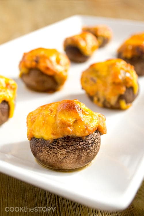 Mushrooms stuffed with chili and topped with gooey cheese