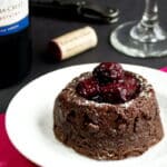 Molten Chocolate Lava Cake with Blackberry Wine Sauce - A romantic dessert for two, paired with a delicious red wine - Get the recipe at COOKtheSTORY.com