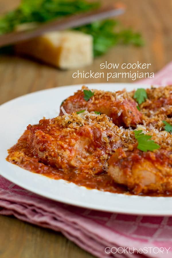 Chicken Parmesan topped with Parmesan and breadcrumbs.