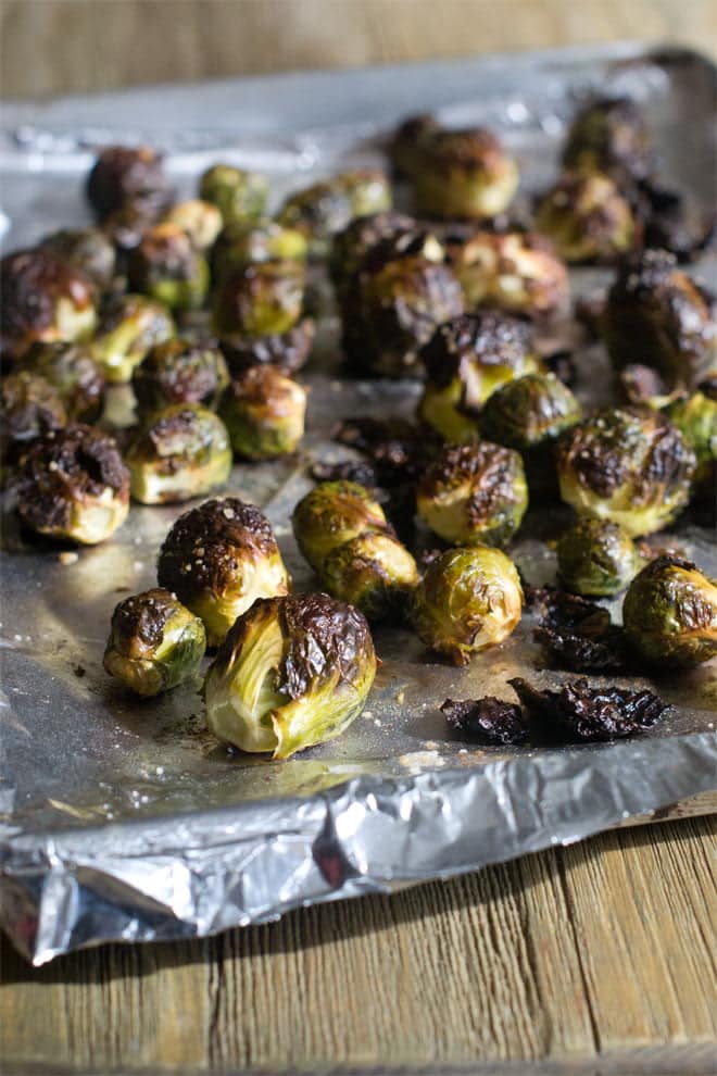 Whole Roasted Brussels Sprouts on a baking sheet