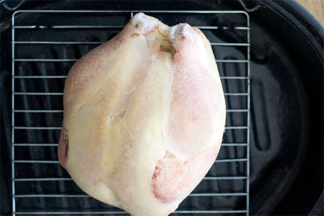Learn how to roast a whole chicken from frozen. That's right. It is possible. Straight from the freezer, to the oven, to your mouth. No defrosting required!