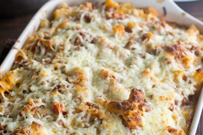 This baked ziti recipe is the real deal - it's the Italian-American classic that you know and love and crave, crave, CRAVE! And guess what? It's easy to make and feeds a crowd.
