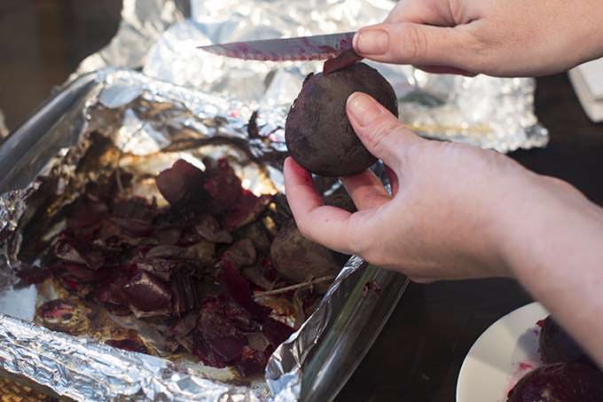 Using paring knife on tough beet skins.