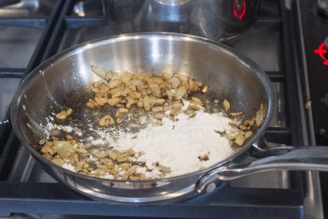 Flour added to pan of browned onion.