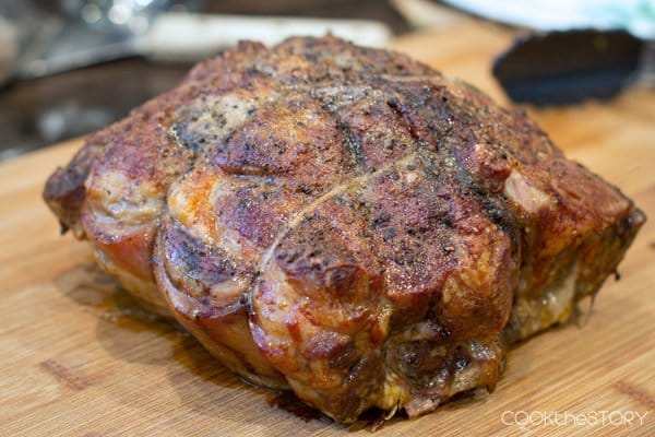 Roasted pork loin on a cutting board.