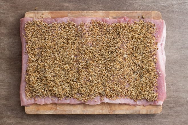 Cut and unrolled pork loin covered with seasoned stuffing.