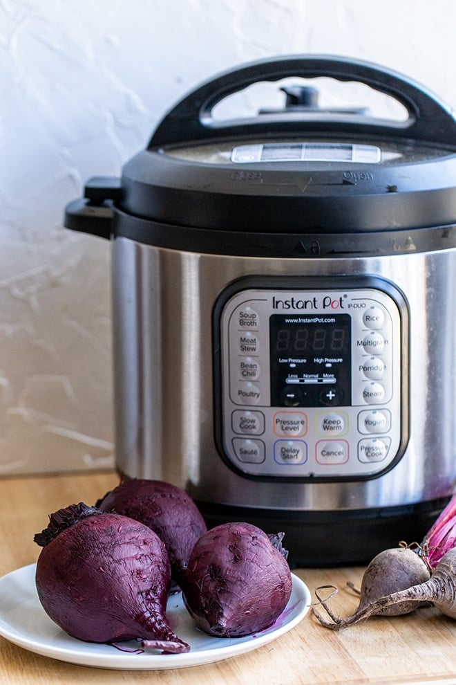 Learn how to cook beets in the Instant Pot. It's really fast and the skins peel right off after they're cooked, which means less mess. 
