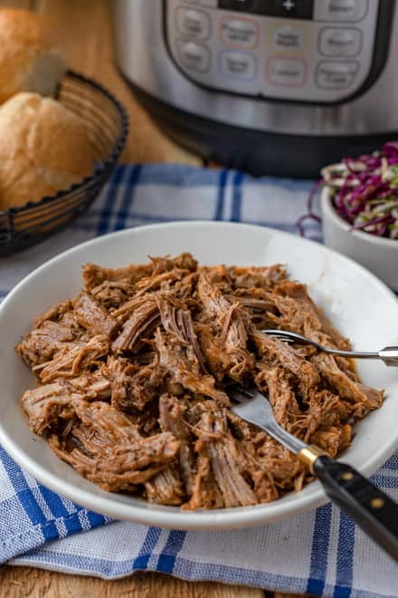 Tender, mouthwatering pulled pork in under 2 hours. Yes, you read that right. Thanks to the Instant Pot, you can have pulled pork sandwiches or tacos on a weeknight.