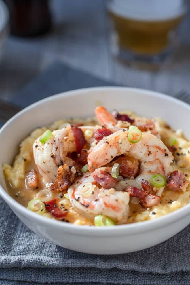 Shrimp and Grits in a white bowl.