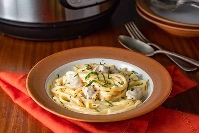 Brown and dish dish with chicken alfredo.