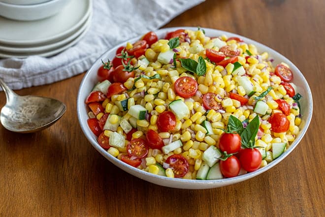 Summer corn salad with tomatoes and cucumber.