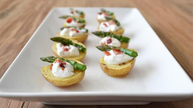 These Baked Potato Bites are a healthier take on the classic appetizer. Made to be bite sized, and with asparagus on top, they look as good as they taste!