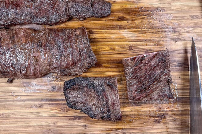 Piece of skirt steak rotated to cut against the grain.