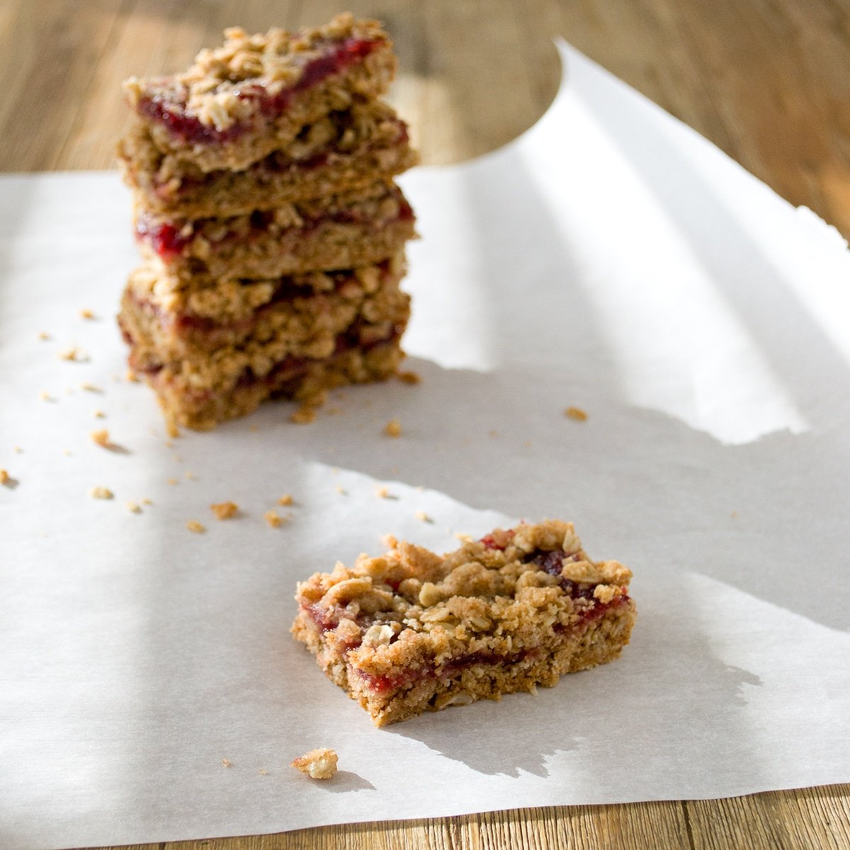 Stack of cranberry oatmeal bars.