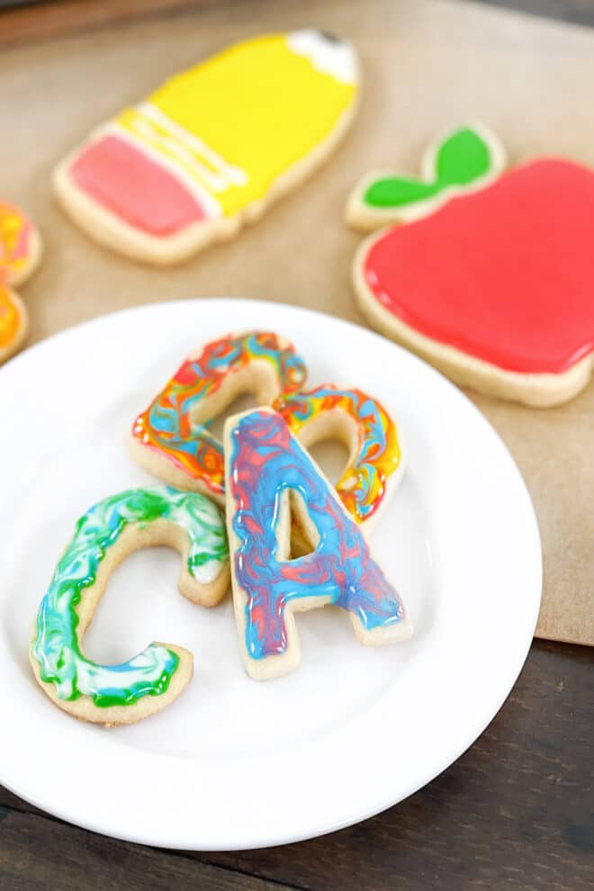 ABC and other back to school cookies decorated with colorful royal icing.