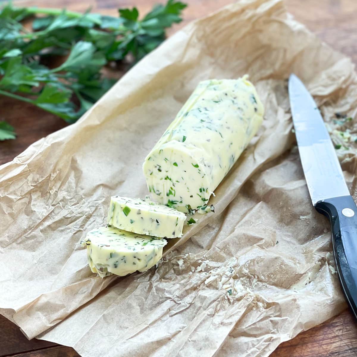 Herb butter for steak on parchment paper