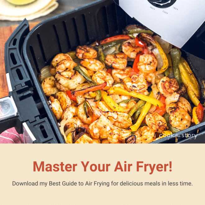 Air Fryer basket with shrimp fajitas. Test reads Master Your Air Fryer!