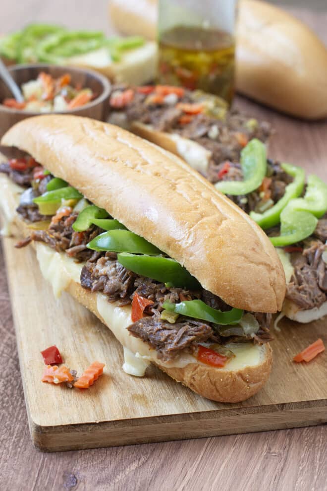 Shredded Beef Sandwiches with green peppers and melted cheese.