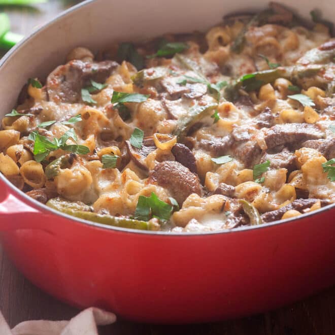 One Pot Cheesesteak Pasta in a red dish.