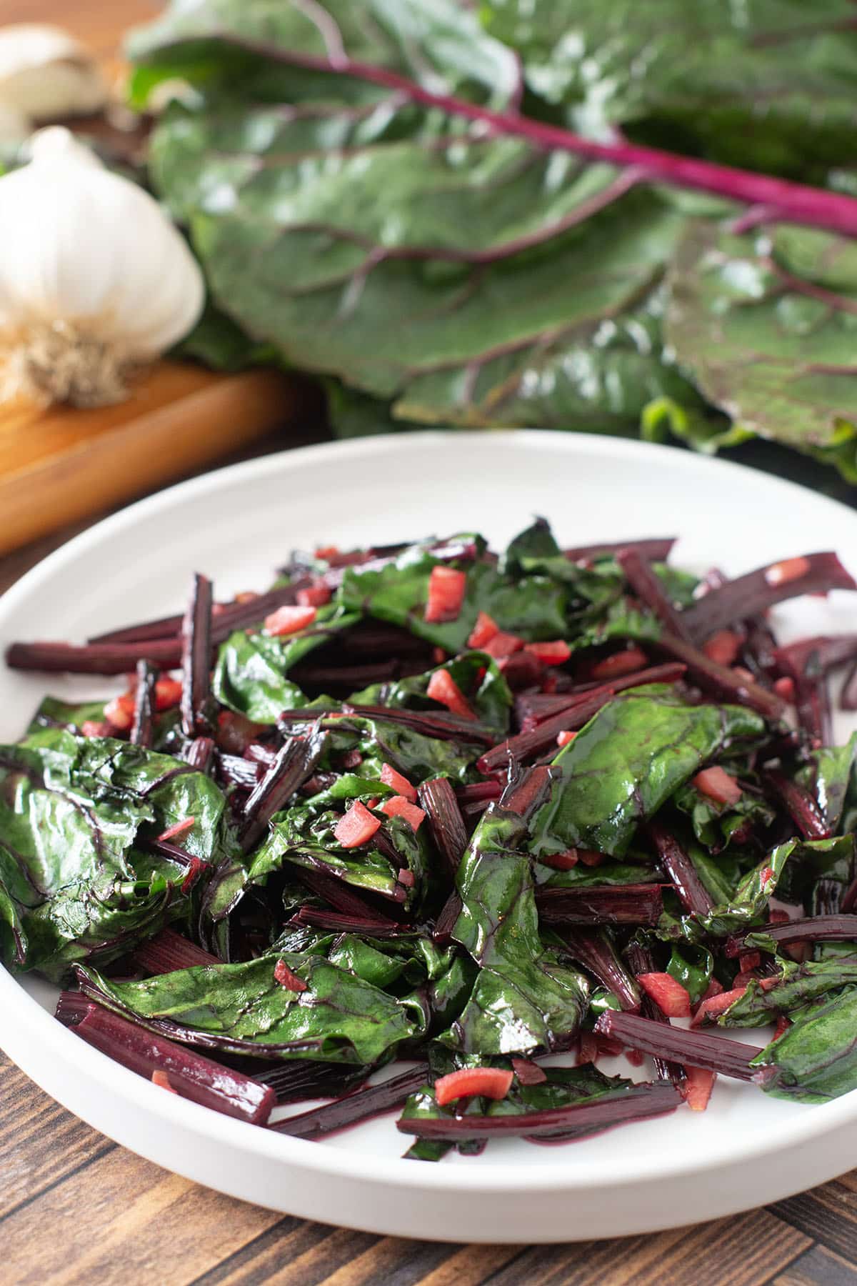 Garlicky Sauteed Beet Greens on a white plate.